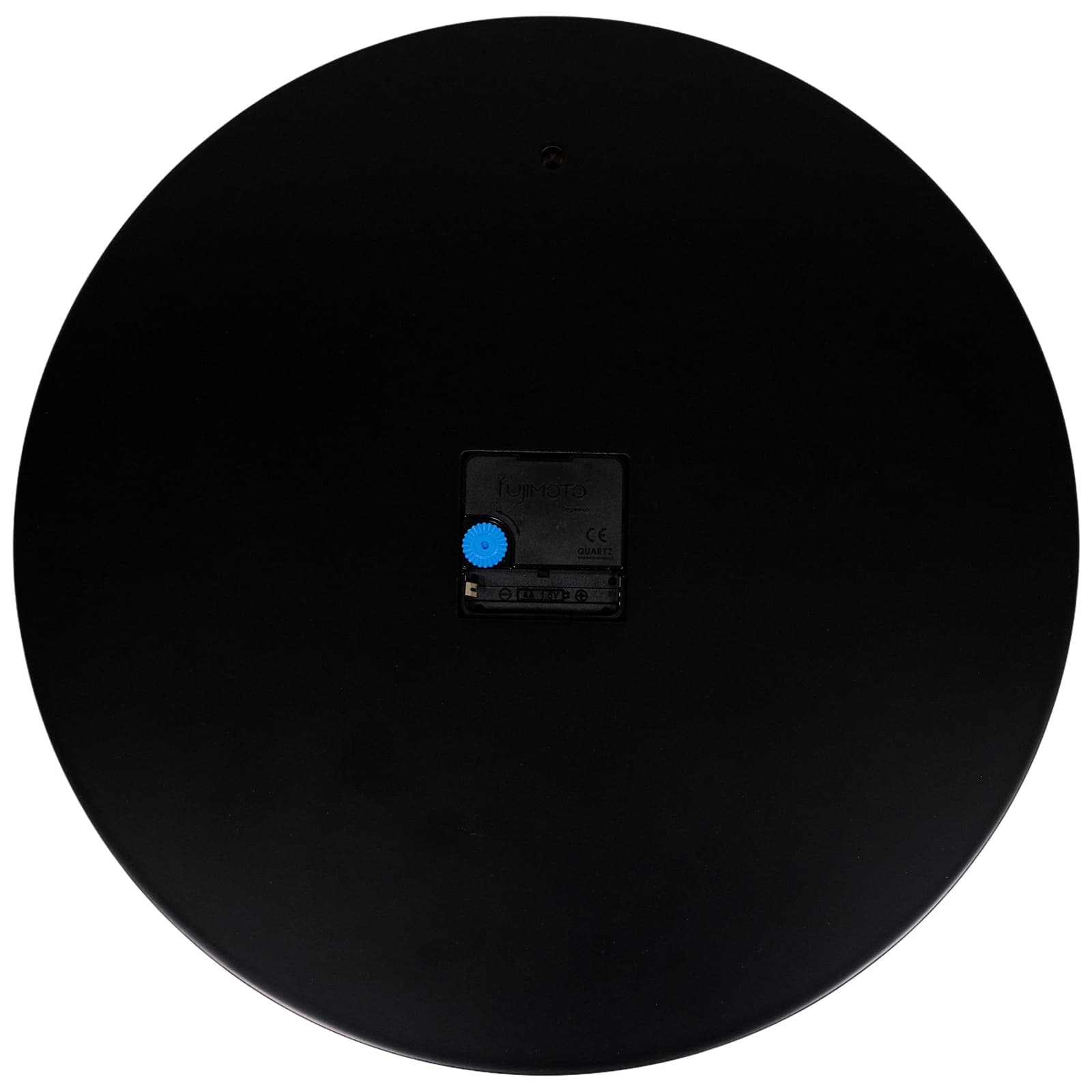 Black circular object with an AA battery slot on the back.