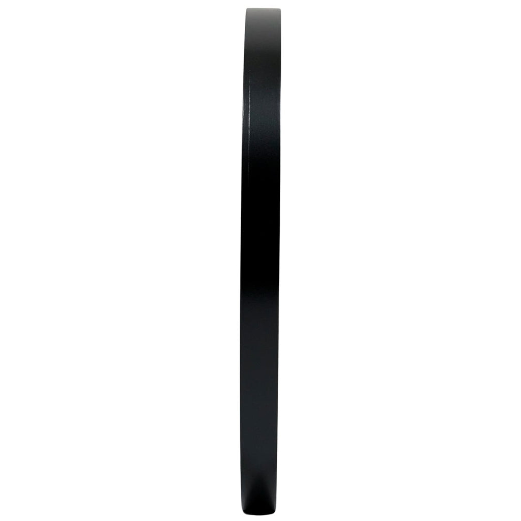 The image shows a side view of a black, narrow object with a smooth surface, likely the side profile of a wall clock.