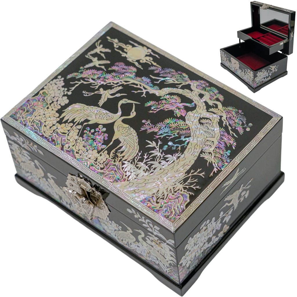 A Mother of Pearl jewelry box with a detailed crane and floral design, shown closed with an inset image of the open box revealing a red velvet interior.