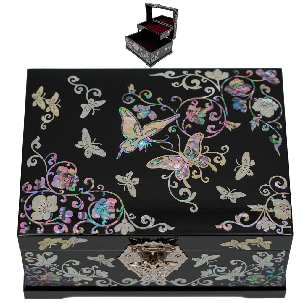A black jewelry box with colorful mother-of-pearl inlays showing butterflies and flowers, with a metal clasp, displayed closed and open in a composite image.