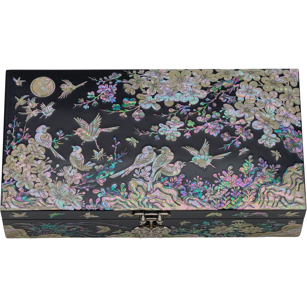 A large, flat rectangular jewelry box adorned with mother-of-pearl inlay, showcasing a vibrant scene with cranes and moon amidst a floral backdrop, radiating a serene charm.
