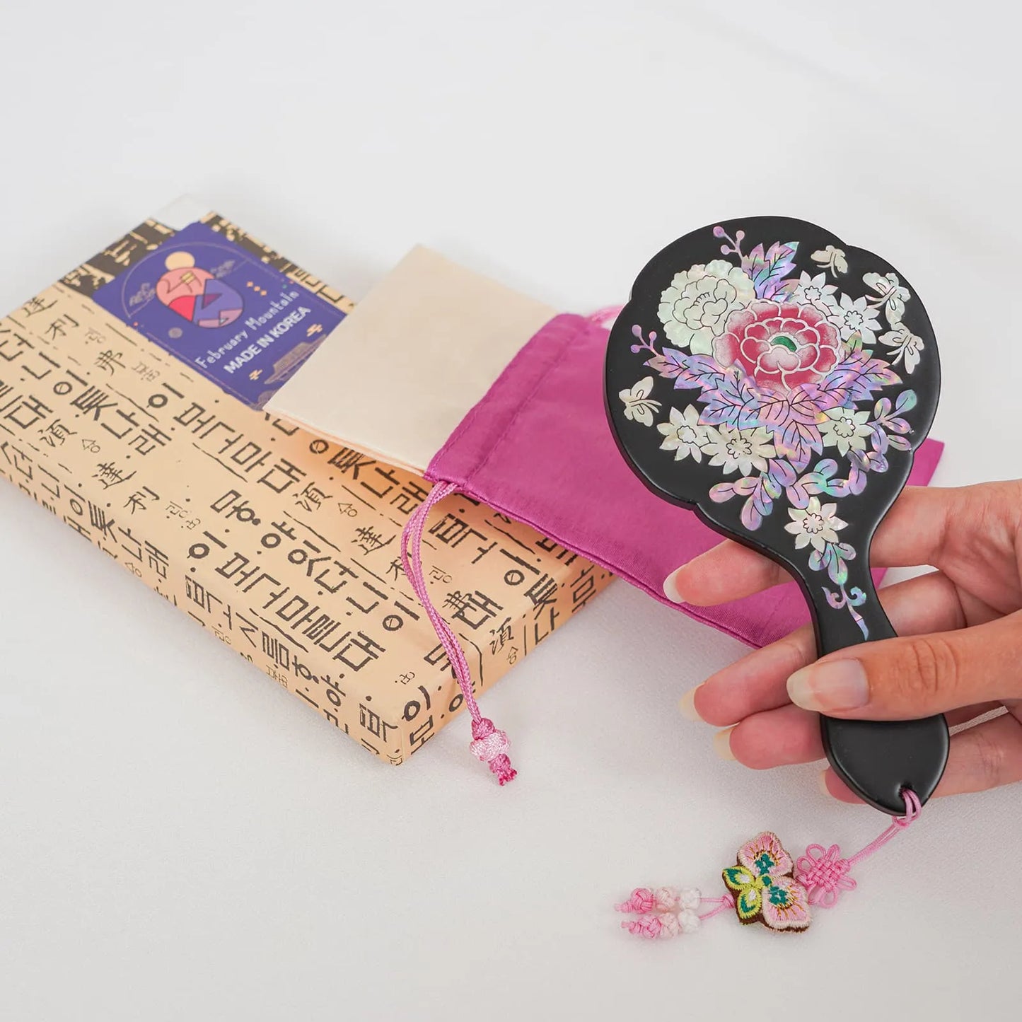 Black floral hand mirror with gift pouch and Korean calligraphy box