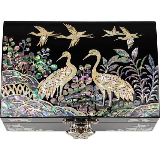 Black jewelry box with crane and flying bird mother-of-pearl inlay on glossy surface