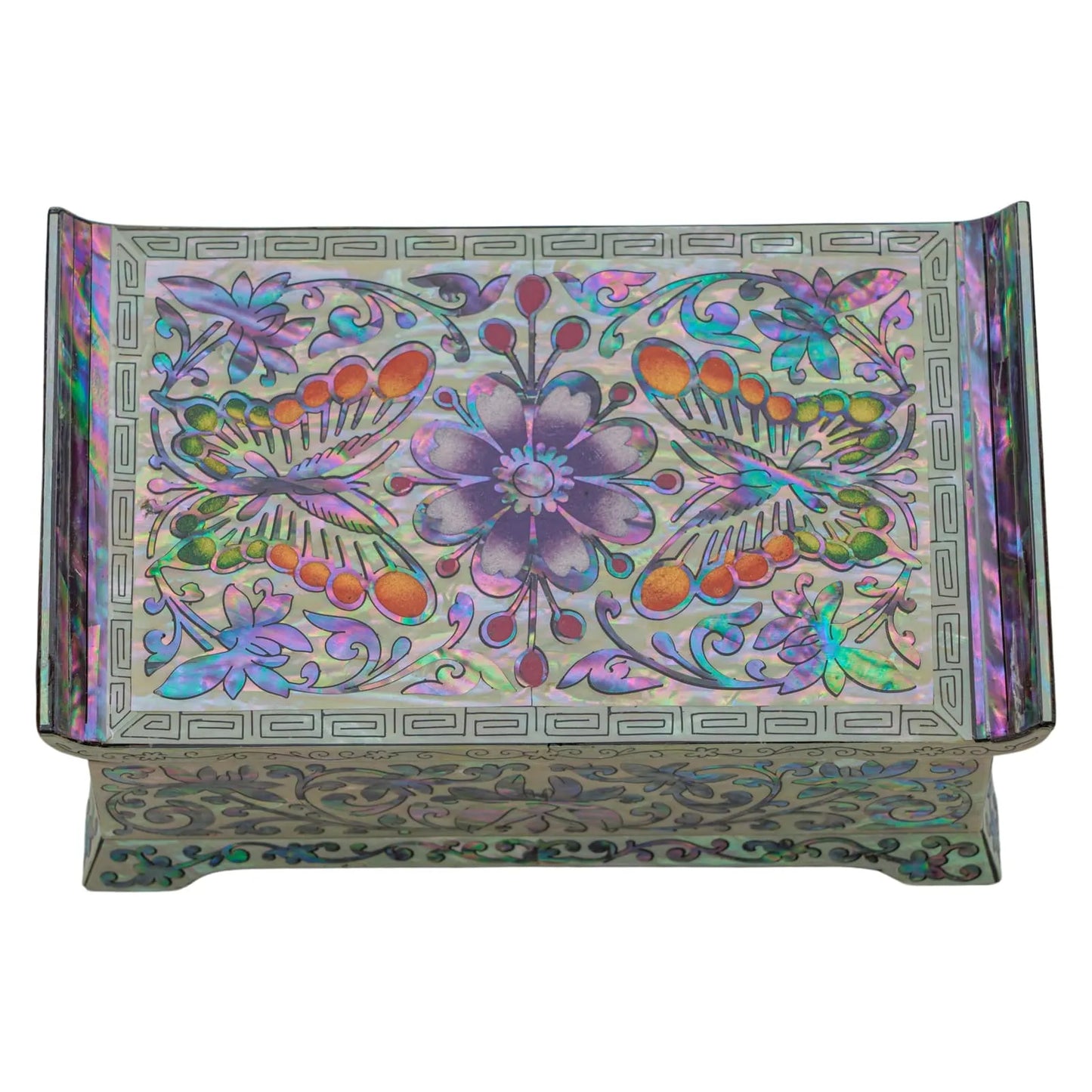Butterfly and flower mother-of-pearl inlay on jewelry box lid, vibrant colors