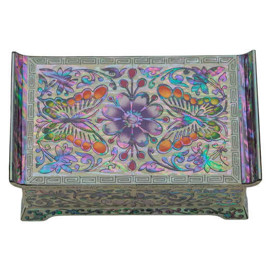 Butterfly and flower mother-of-pearl inlay on jewelry box lid, vibrant colors