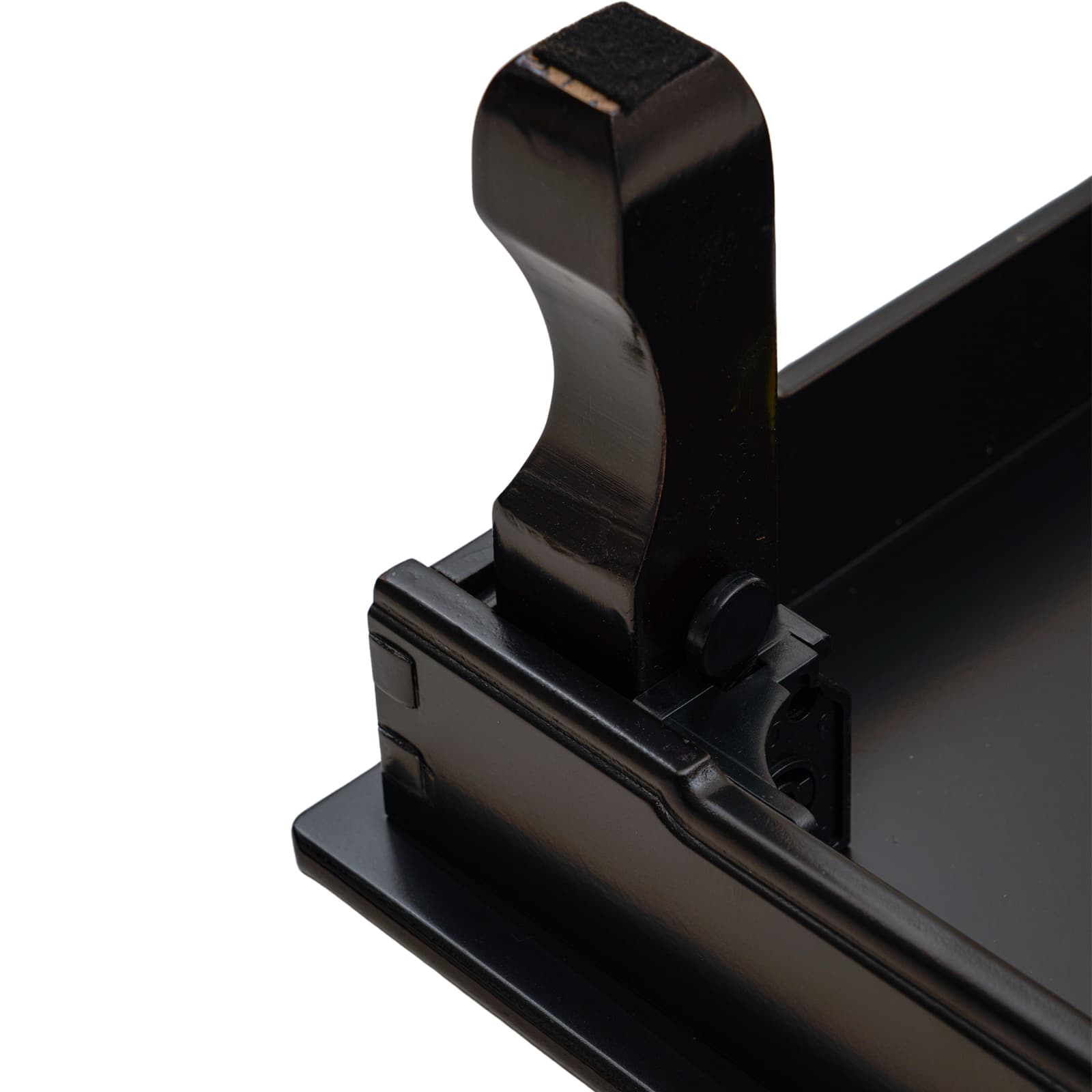 Close-up view of the leg joint of a black lacquered tray, showcasing the detailed craftsmanship and sturdy construction.
