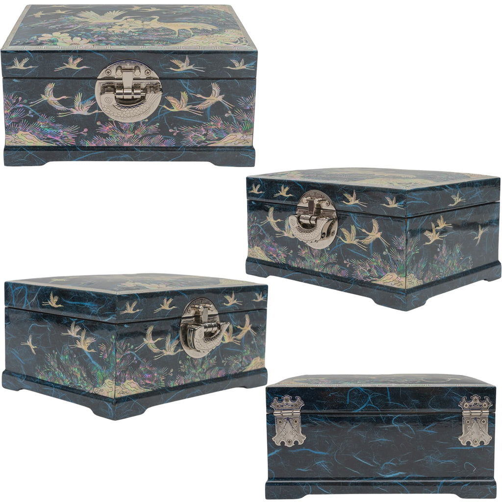 Four mother-of-pearl inlaid boxes displayed from different angles, showcasing detailed crane and floral designs on a dark background with metallic latches; one box has unique corner ornam