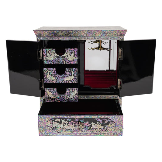 Open jewelry box revealing 3 small drawers with bird designs, a red velvet ring holder, a built-in mirror, and a necklace carousel