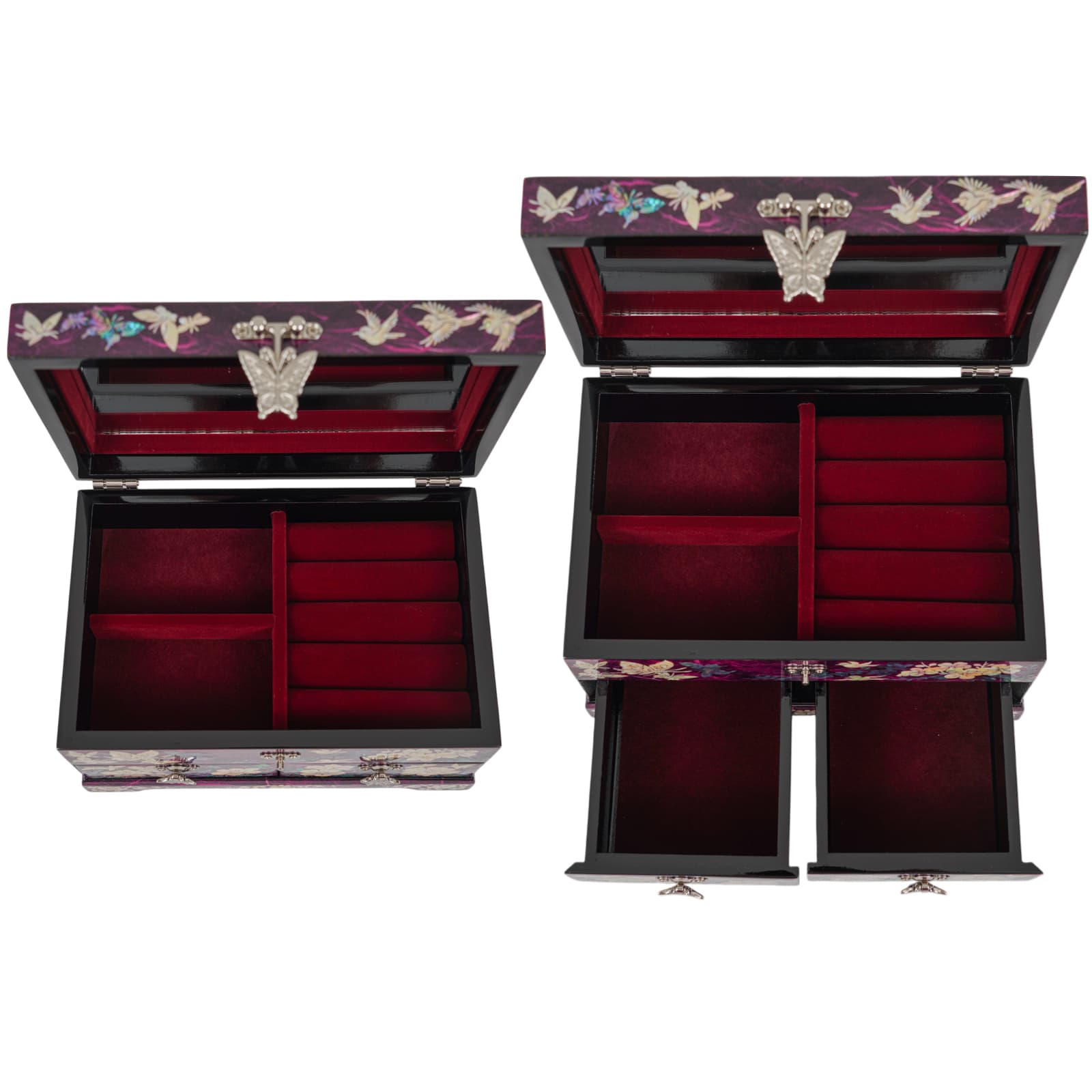 Open jewelry box showing ring rolls and divided sections in red velvet