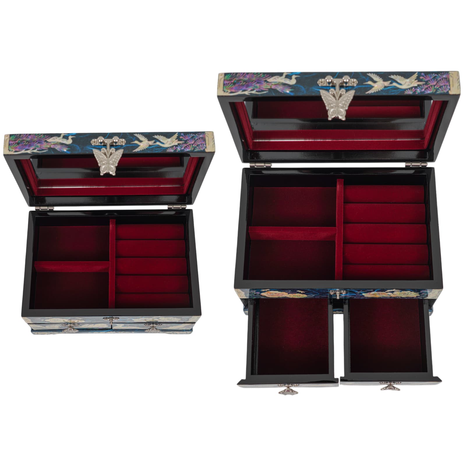Open view of two jewelry boxes showing red velvet-lined compartments and ring holders