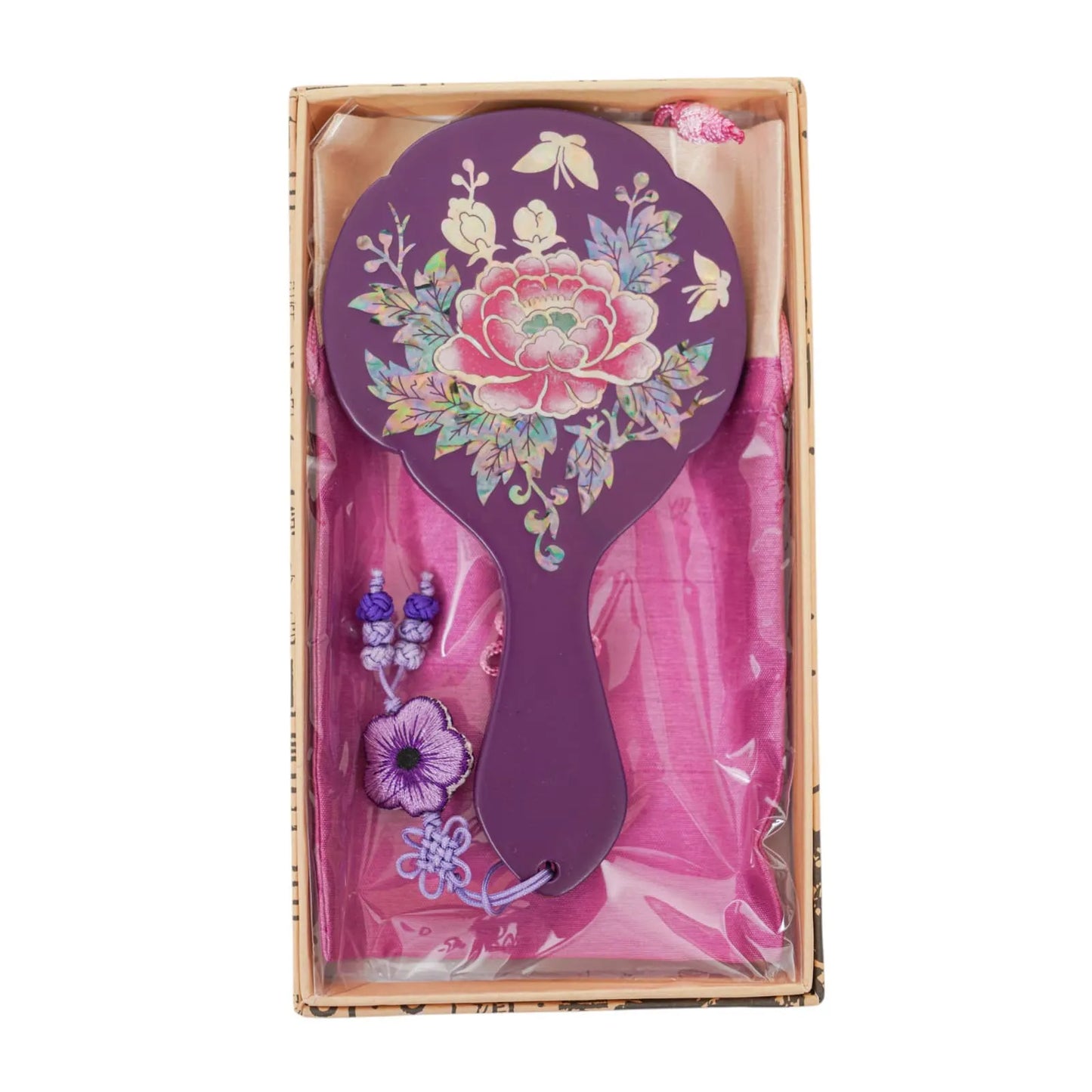 Purple hand mirror with peony inlay, packed in a pink satin pouch gift box