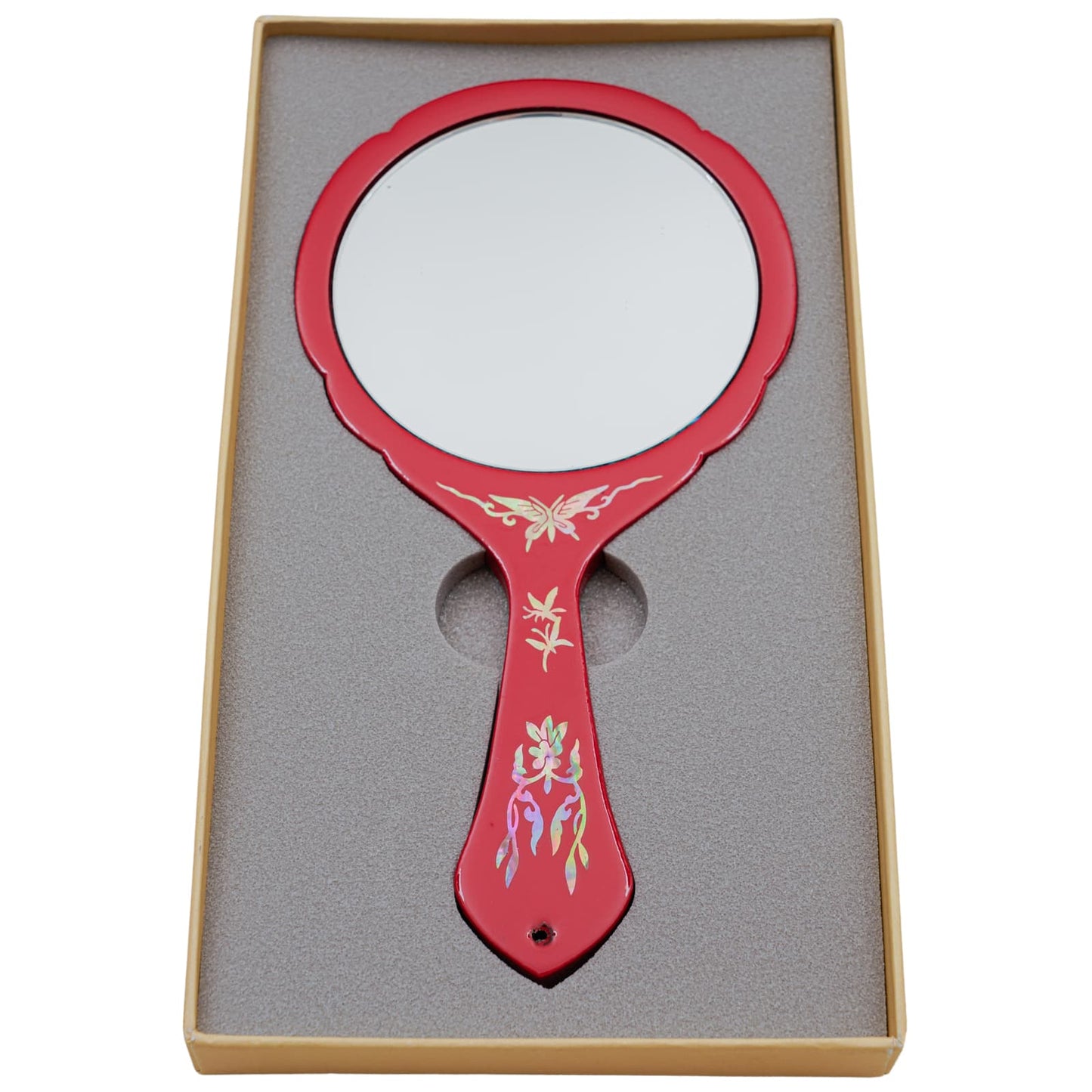 Red hand mirror with a plain reflective surface, decorated with mother-of-pearl inlay, in a foam-lined box.