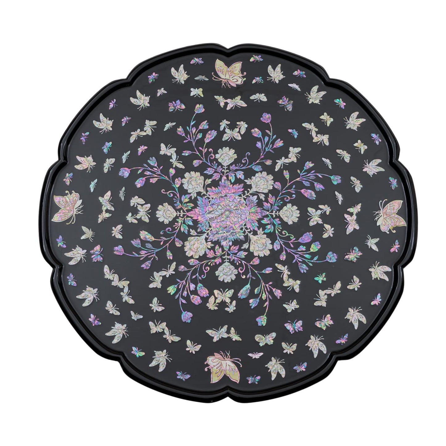 Top view of a black round table with intricate mother-of-pearl inlay of flowers and butterflies, featuring scalloped edges.