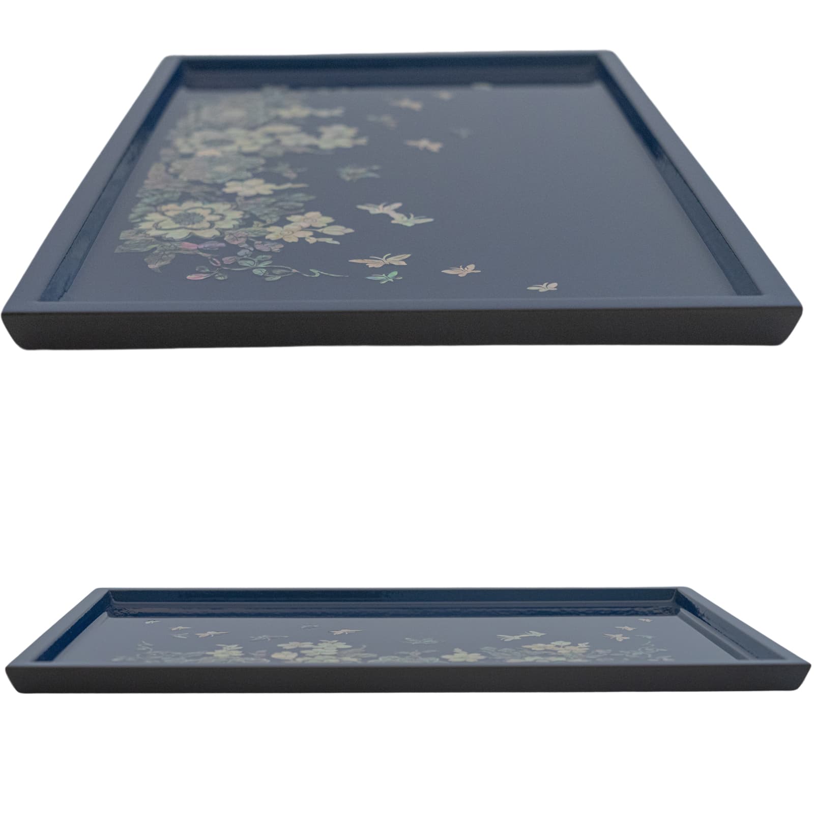 Two dark blue rectangular trays with Mother of Pearl inlay depicting flowers and butterflies, one viewed from above and the other at an angle with a visible side.
