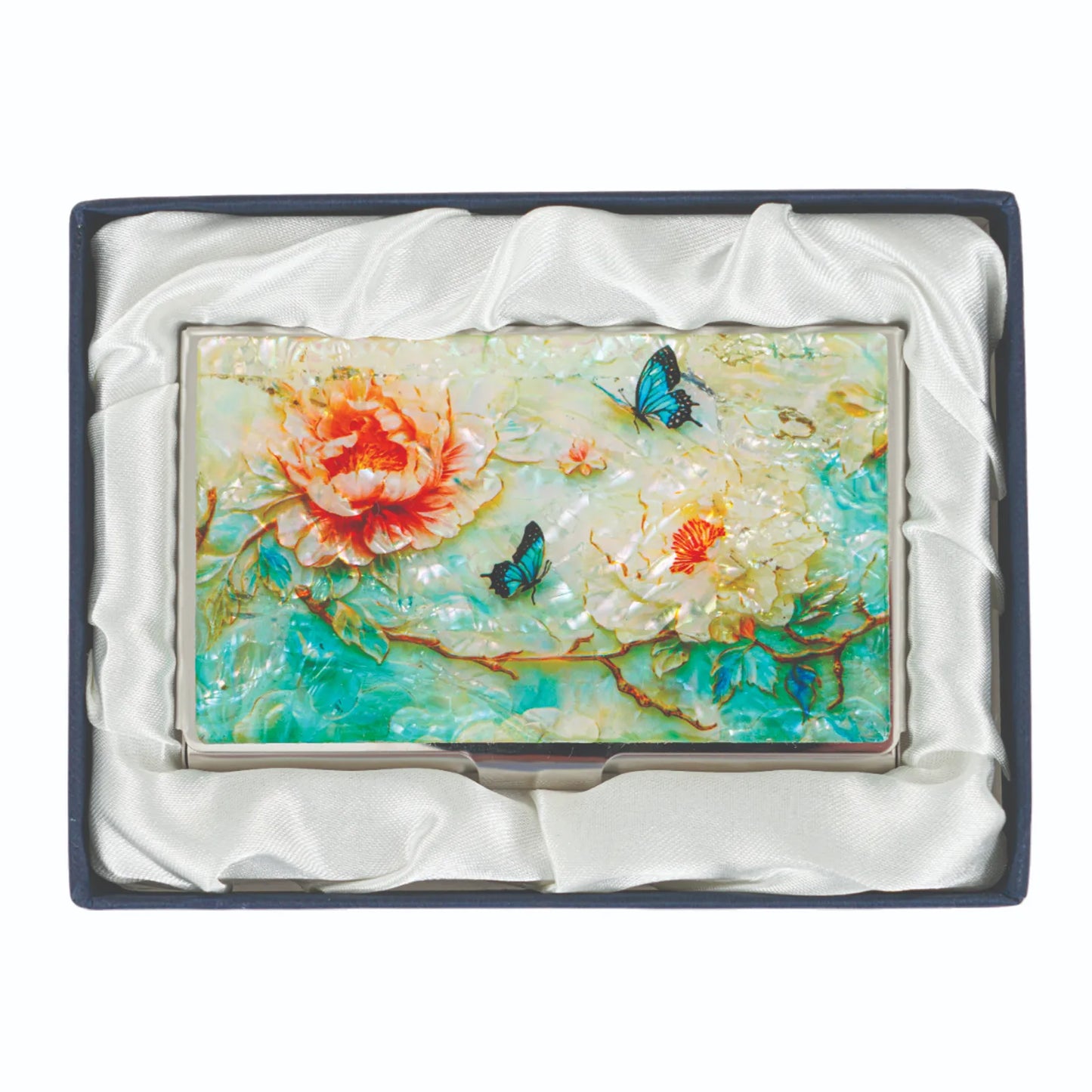 Decorative business card holder with floral and butterfly design on a white background