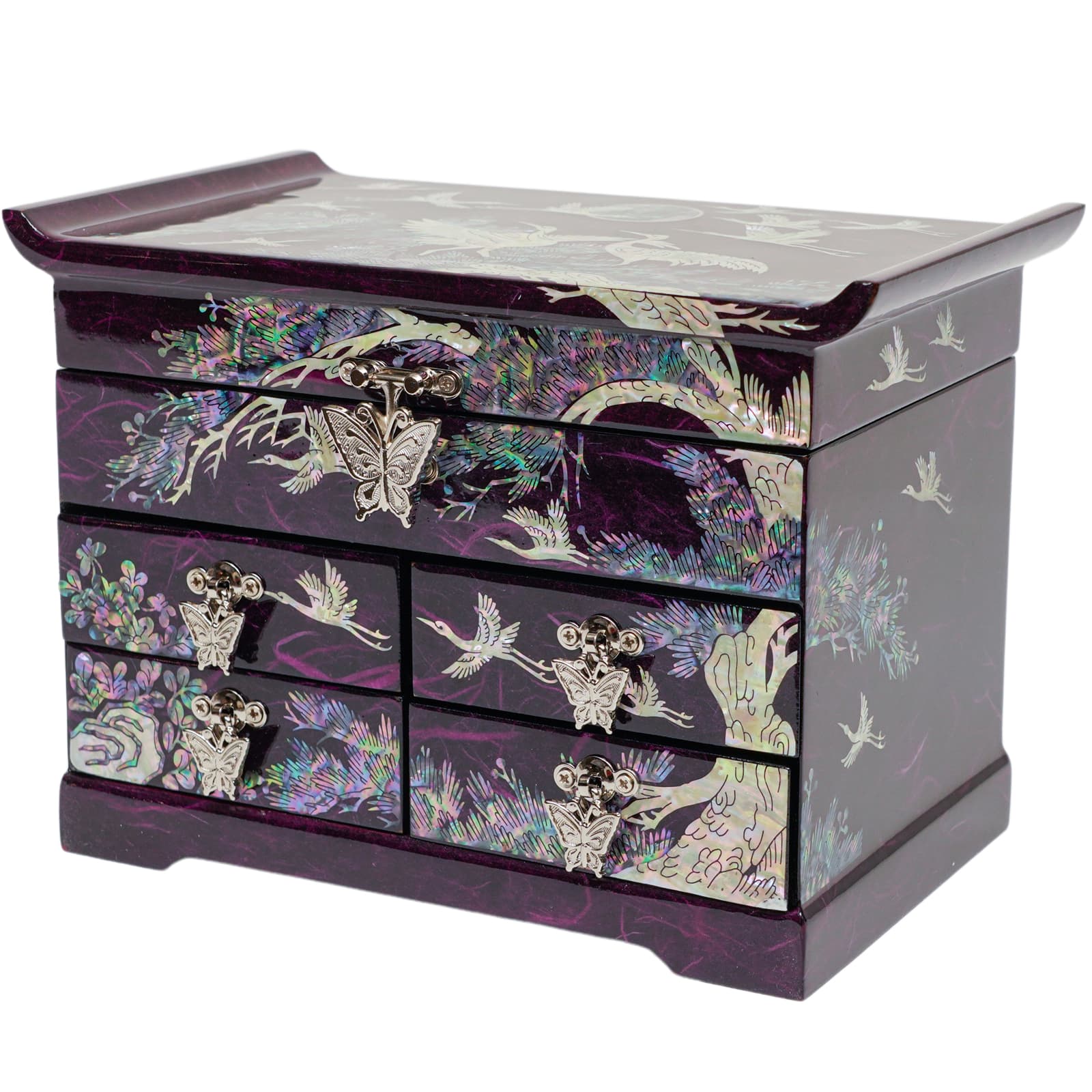 A purple Korean mother-of-pearl jewelry box with crane, pine tree, and butterfly designs, featuring multiple drawers with metal handles.