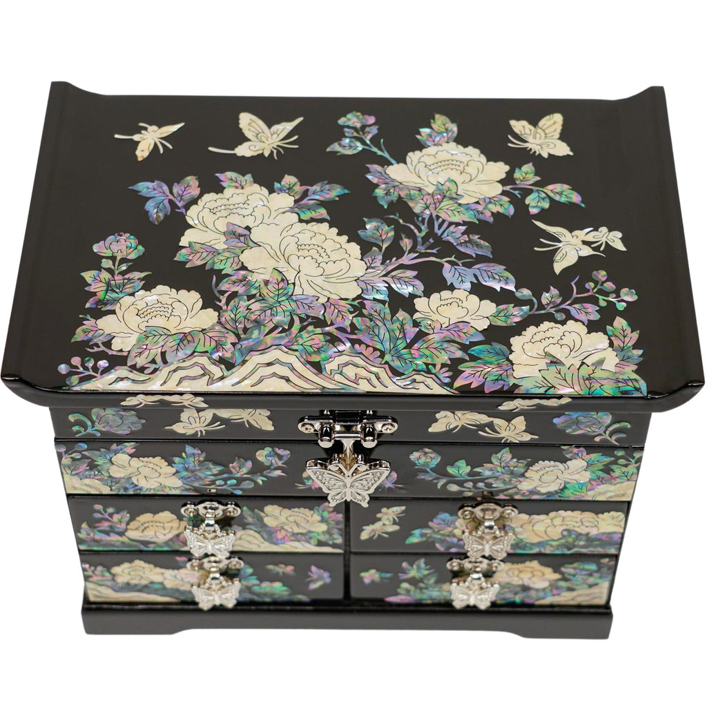 A black mother-of-pearl jewelry box with intricate peony and butterfly designs and silver clasp. Perfect for gifting.