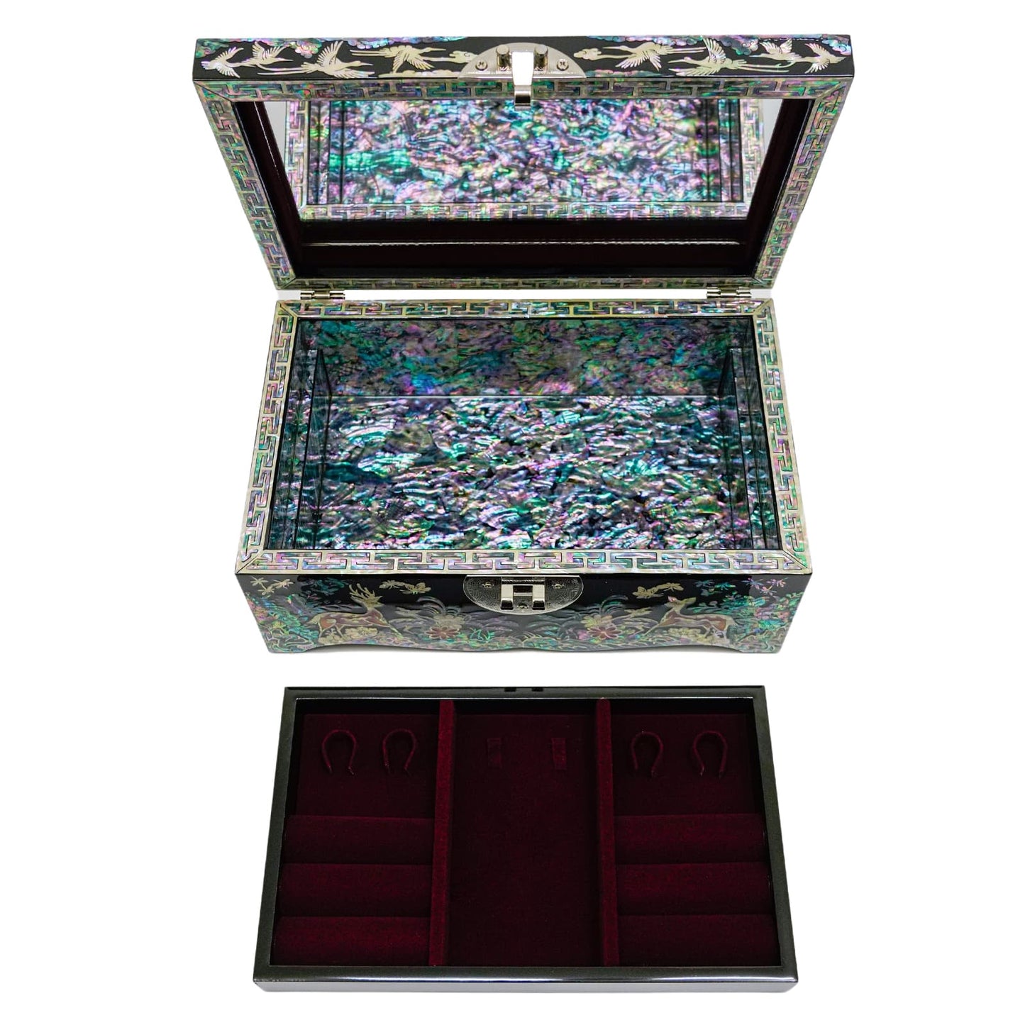A stunning Mother of Pearl jewelry box featuring detailed bird and floral designs. The shimmering exterior opens to reveal a captivating iridescent interior.