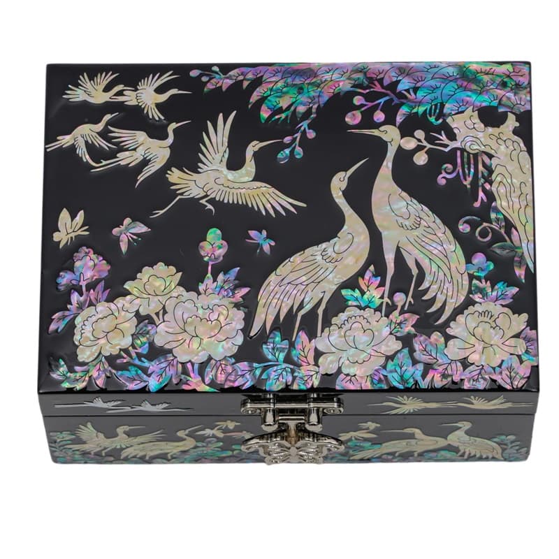 A black decorative box with detailed mother-of-pearl inlay depicting cranes and peonies, showcasing intricate Asian craftsmanship.