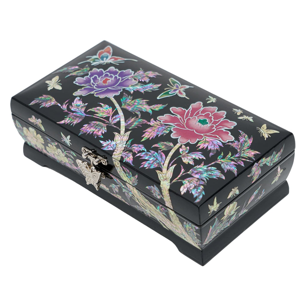 A black jewelry box with colorful mother-of-pearl inlay depicting floral designs and a metal clasp.