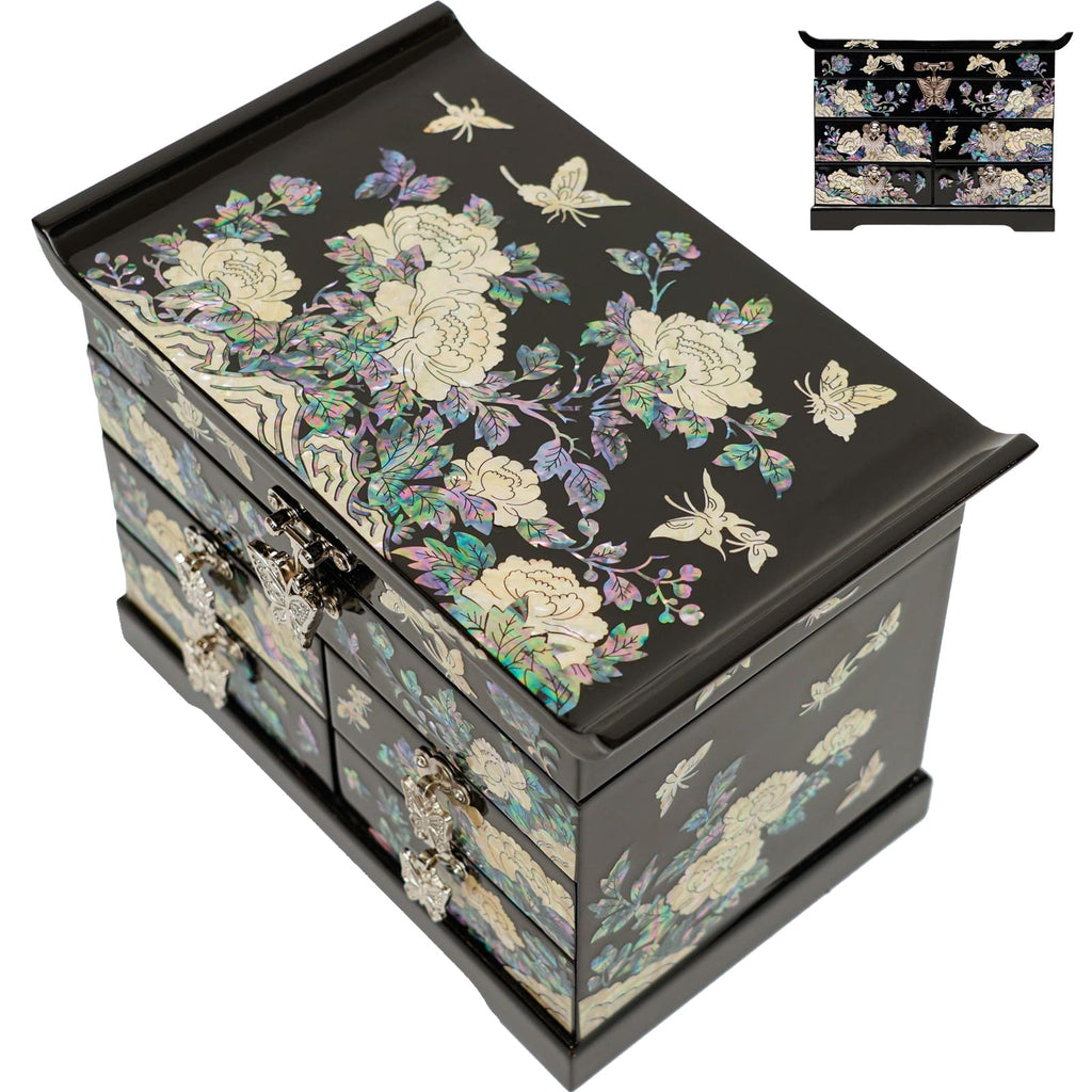 A black lacquered jewelry box with mother-of-pearl peony and butterfly inlays, multiple drawers, and metal clasps.