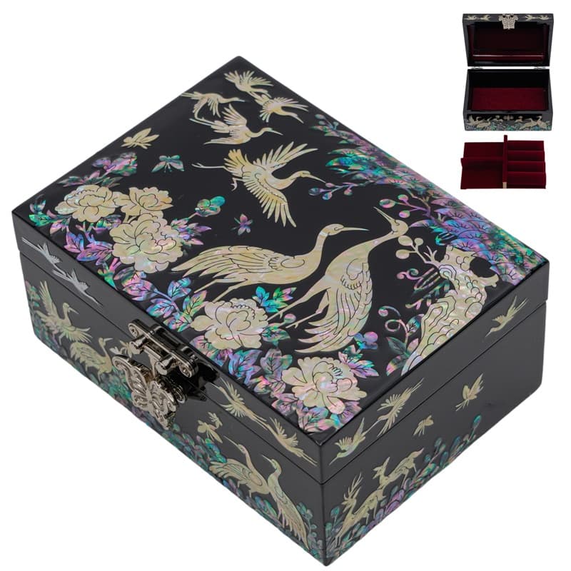 A black lacquer jewelry box with a mother of pearl crane and peony design, including a red velvet interior and a sectioned removable tray.