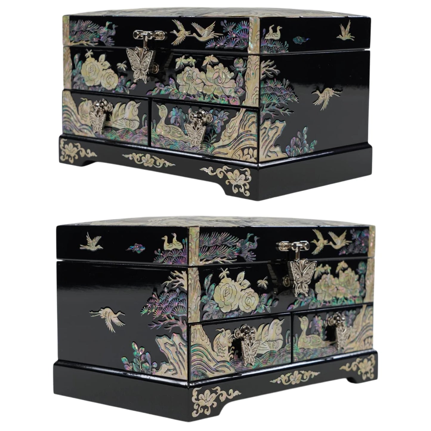 A frontal three-quarter perspective of a black mother of pearl chest, highlighting its traditional floral and bird inlays, including cranes on the side panel.