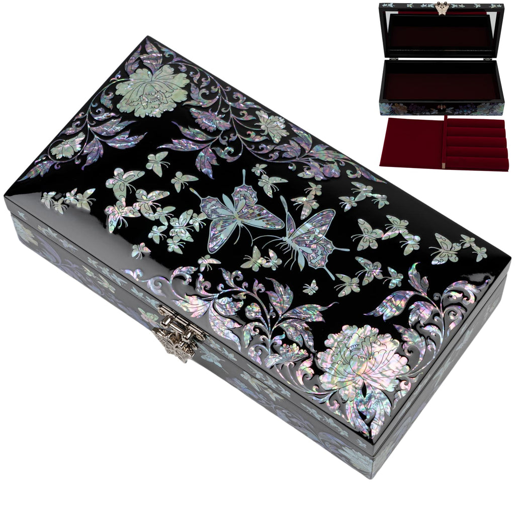 A jewelry box with mother of pearl butterfly and floral designs on a black lacquer background, including an inset image showing a red velvet interior.