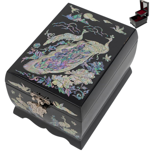 Angled view of a black jewelry box with peacock inlays; includes an inset image of the open box with red velvet lining and a mirror.