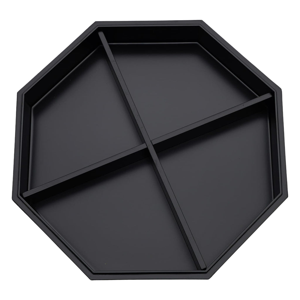 An octagonal black box with a crisscross divider creating four compartments, viewed from above.