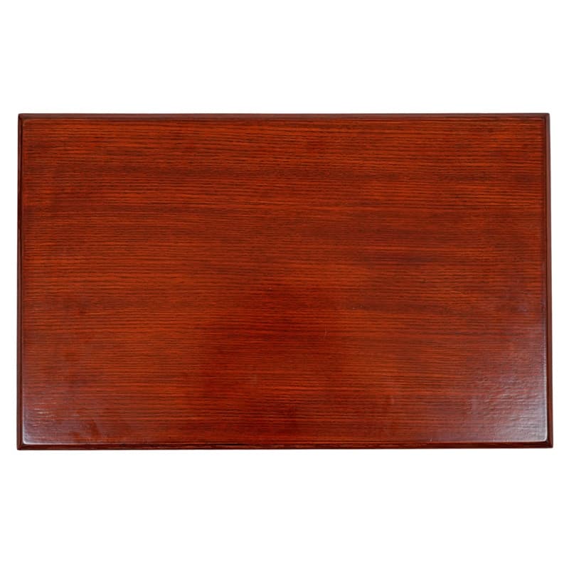 A plain wooden tray with a smooth, polished finish and a rich red-brown color.
