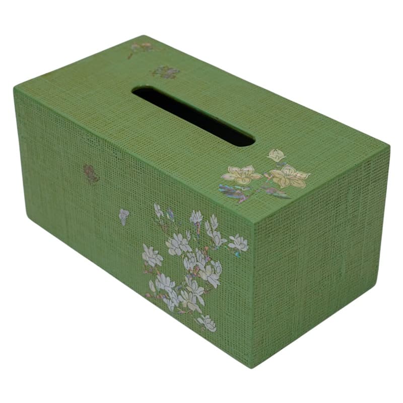 A rectangular green tissue box cover with a delicate mother-of-pearl floral design on the side.