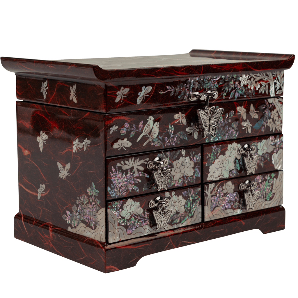 A side view of a dark red mother-of-pearl inlaid jewelry box.