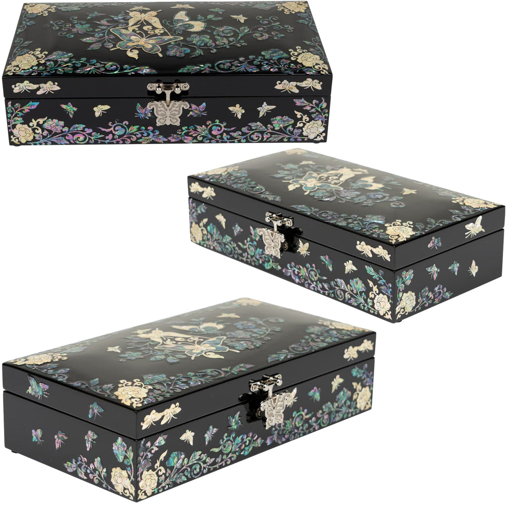 A trio of images displaying a rectangular black jewelry box with a mother-of-pearl inlay depicting intricate floral and butterfly designs, each image showcasing the box from a different angle to highlight the ornate details and the box's exterior elegance.