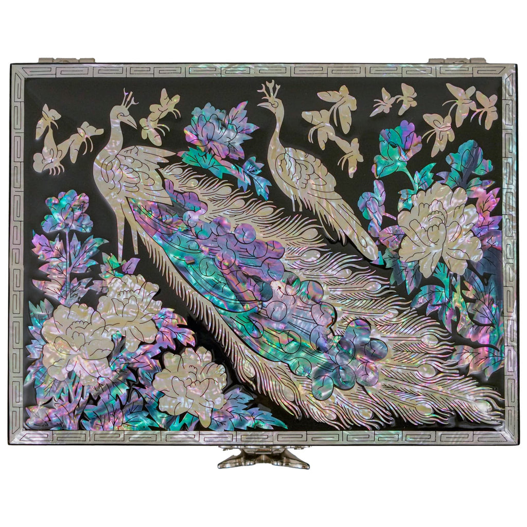  A vibrant Mother of Pearl peacock adorns this decorative box, surrounded by colorful florals, reflecting light and showcasing detailed artistry.