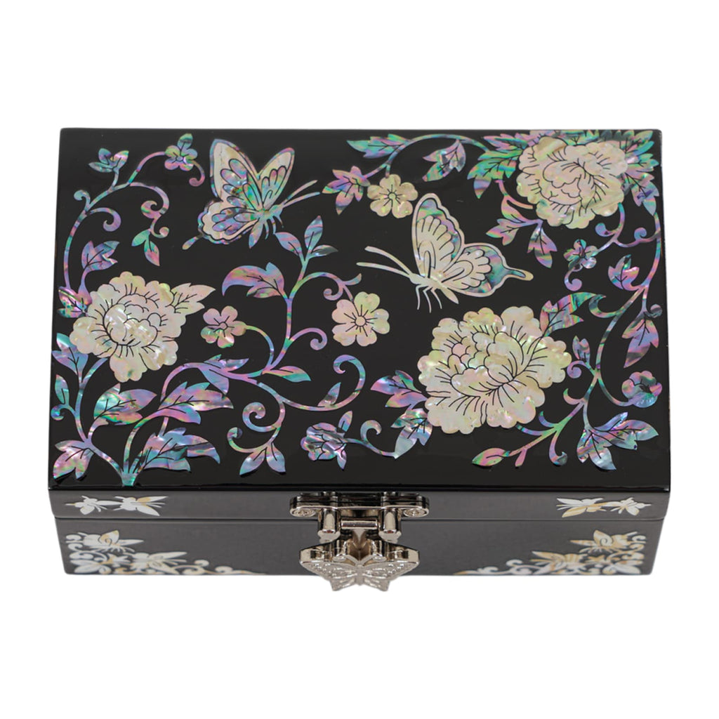 Black lacquer box with floral and butterfly mother-of-pearl inlay on the lid