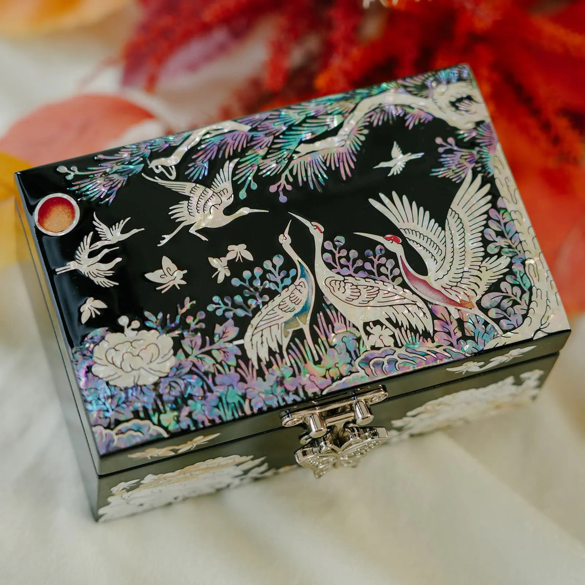 Crane mother of pearl jewelry box, black lacquer with cranes, pine and red sun, autumn backdrop