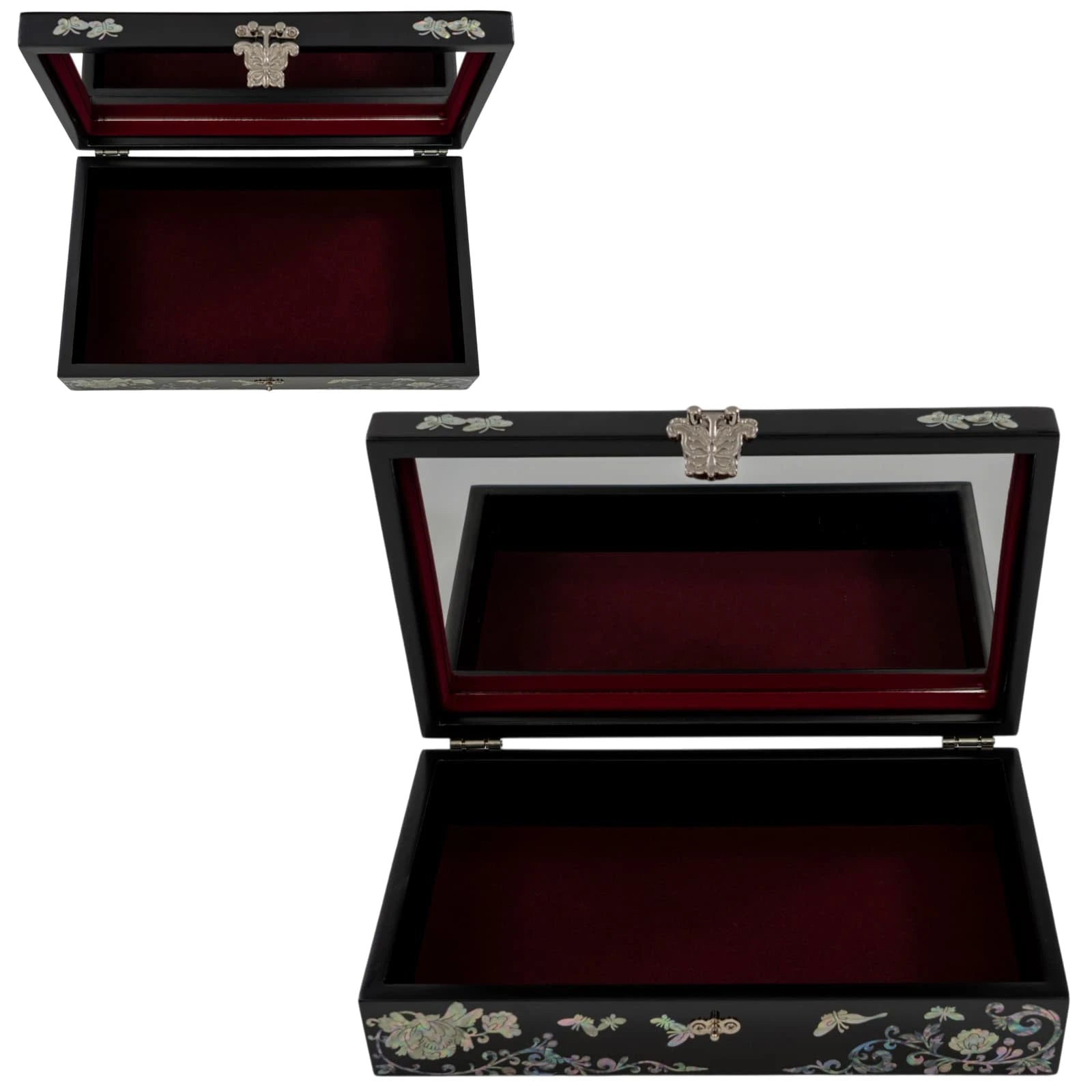 Detailed front view of a black box showcasing symmetrical shimmering butterfly inlays and an ornate butterfly-shaped lock