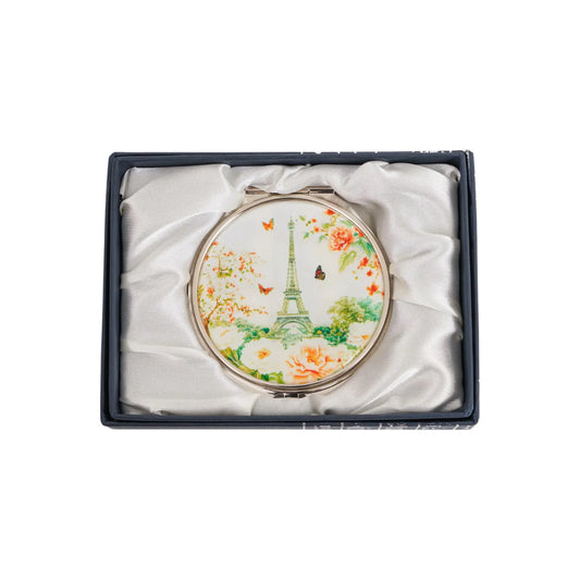 Elegant compact mirror featuring Eiffel Tower, butterflies, and flowers, nestled in a satin-lined gift box