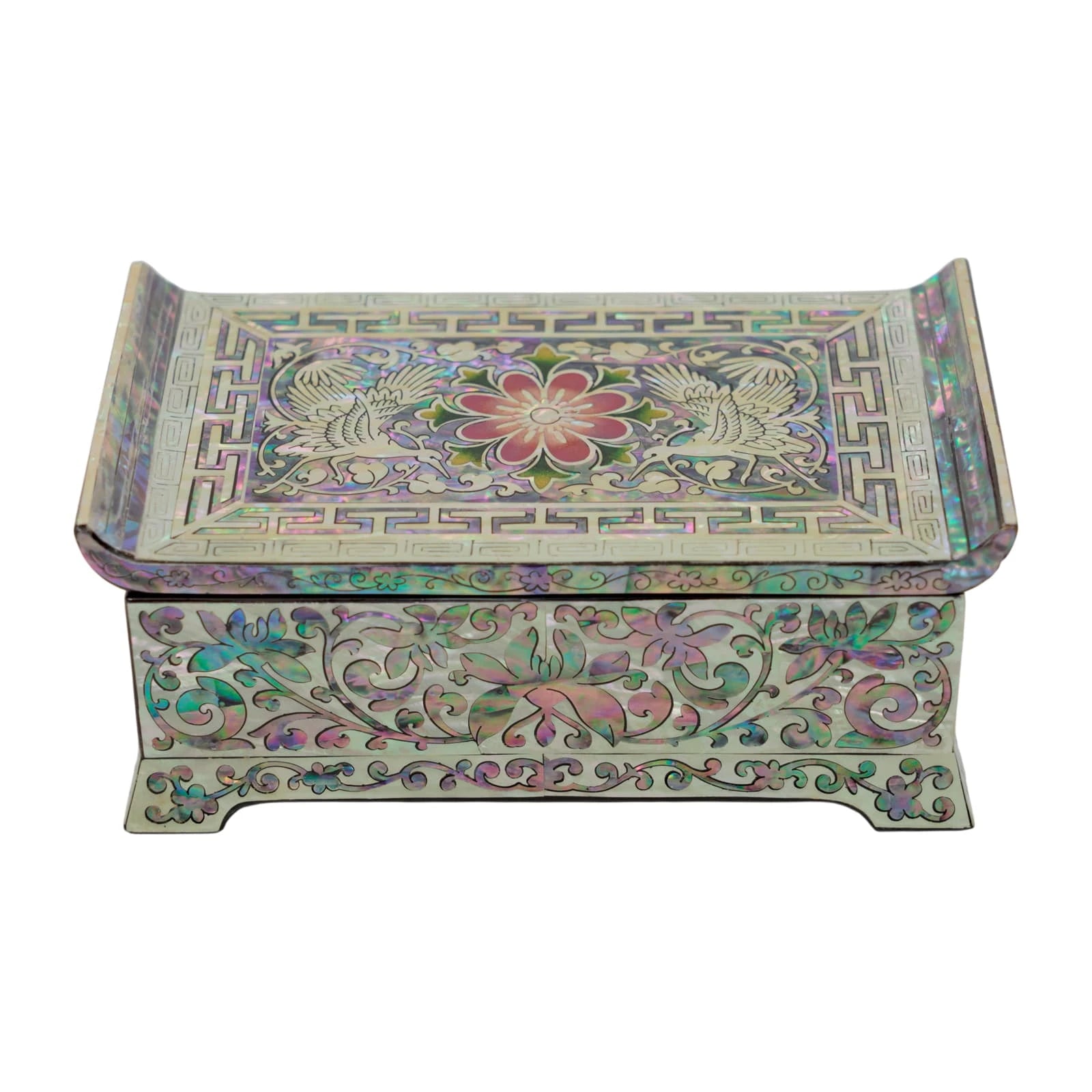 Frontal view of a Korean Najeonchilgi box. Features elaborate mother of pearl flower and vine motifs on a footed lacquer base