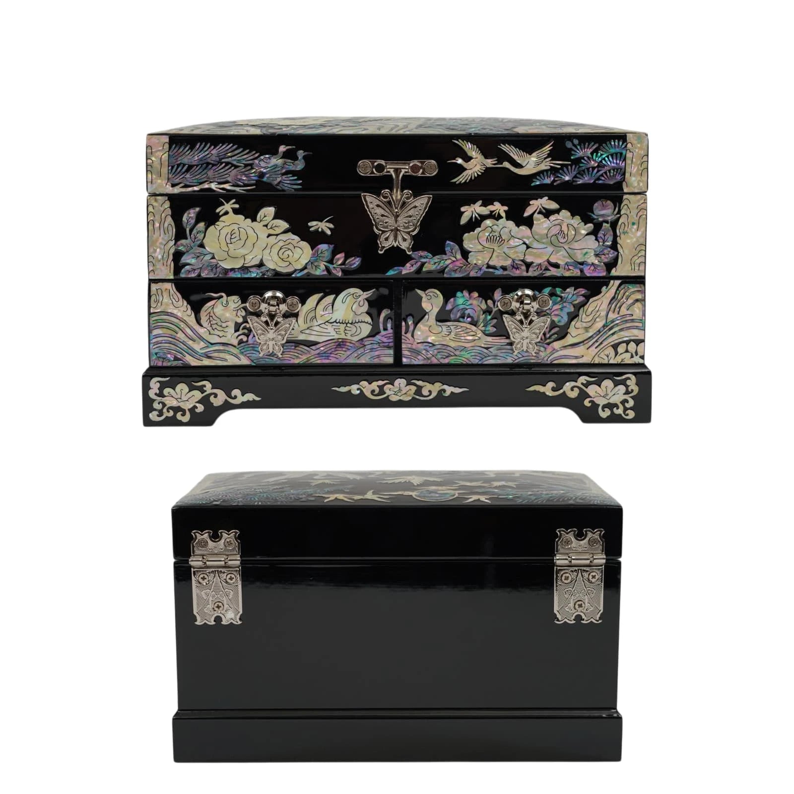 Front and back perspectives of a two-drawer black jewelry chest. Features peacock and duck nacre inlays, a butterfly clasp, and floral motifs