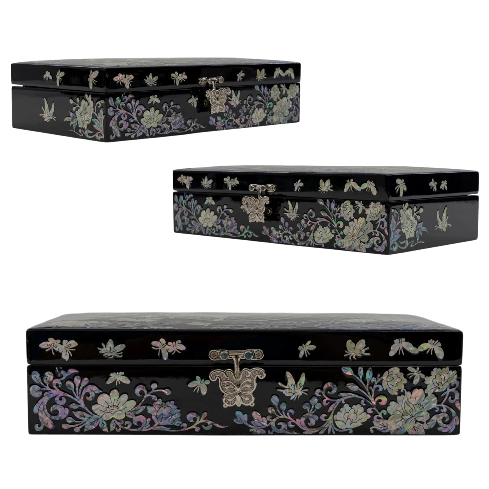 Front view of a black box showcasing a striking circular mother-of-pearl layout filled with detailed butterflies and scrolling vines