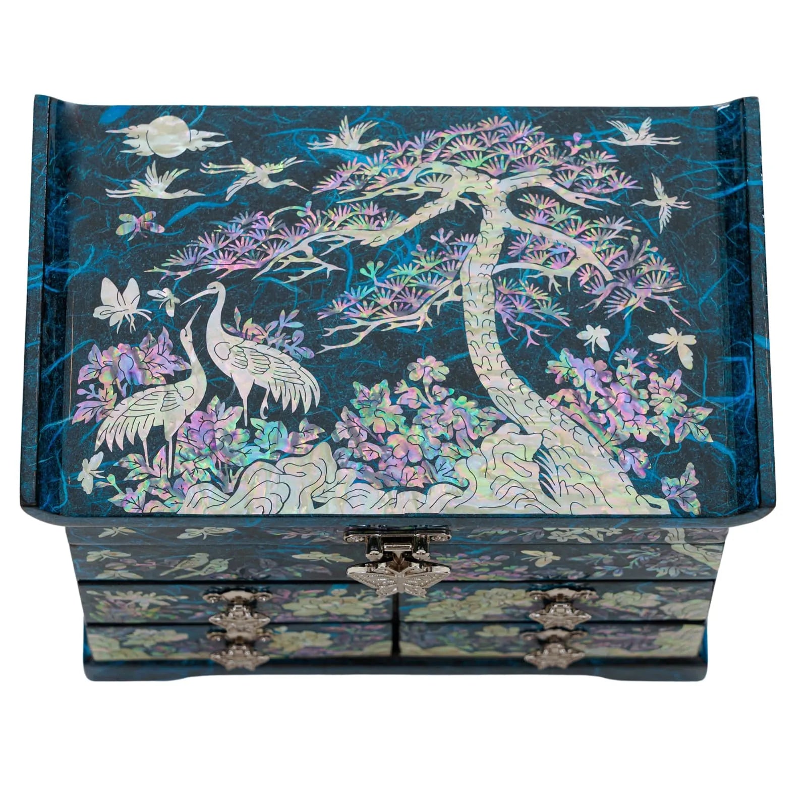 Front view of blue jewelry box with crane and pine design inlaid in abalone on lacquer surface