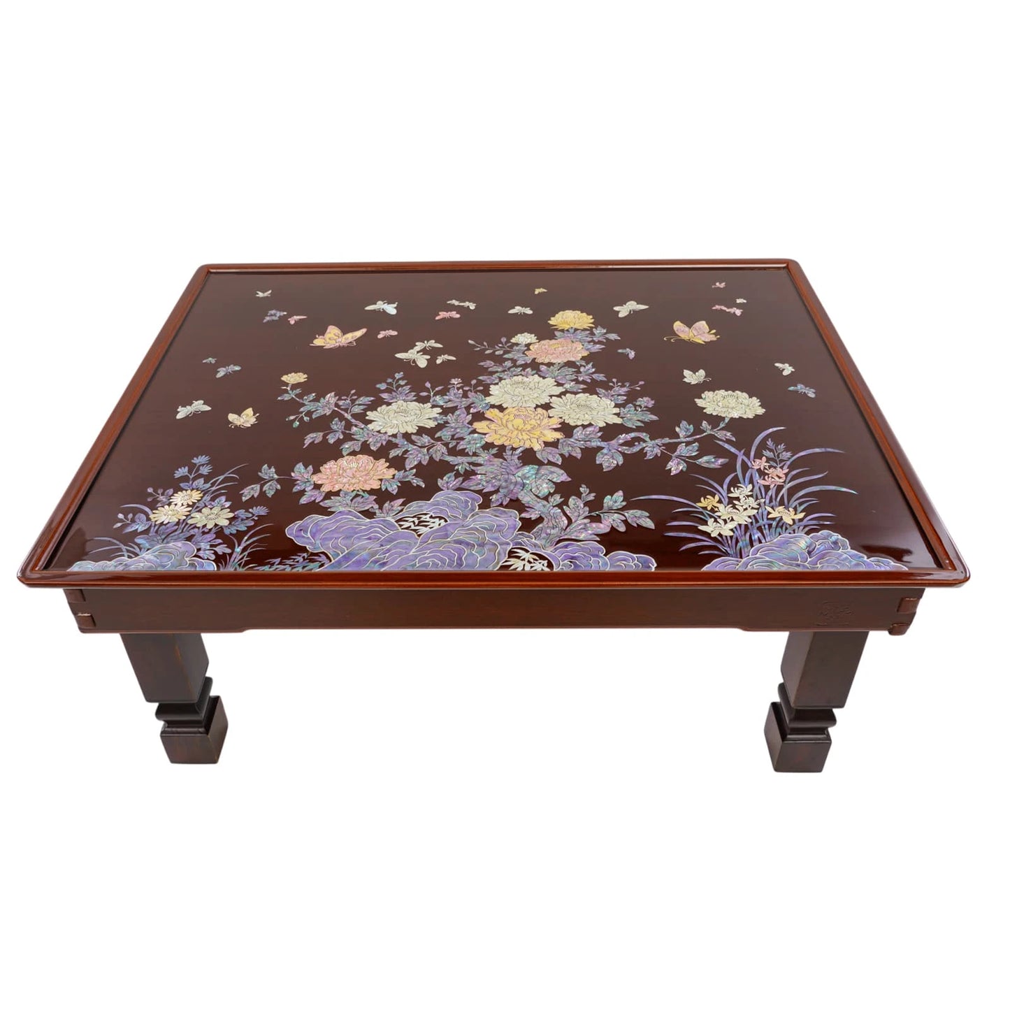 Front view of handcrafted Korean lacquered coffee table with mother of pearl floral inlay and solid wooden legs