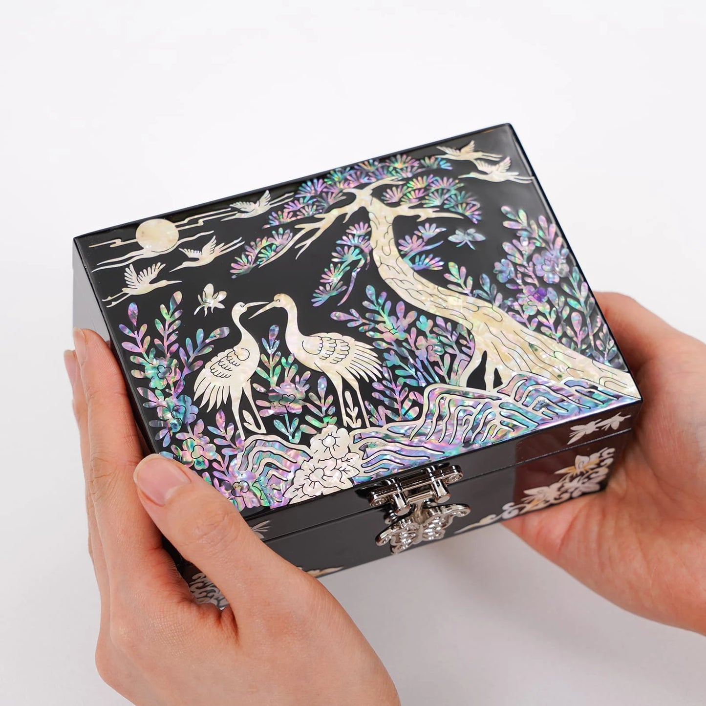Handheld black lacquer jewelry box with mother of pearl crane inlay, compact luxury vanity storage box made in Korea