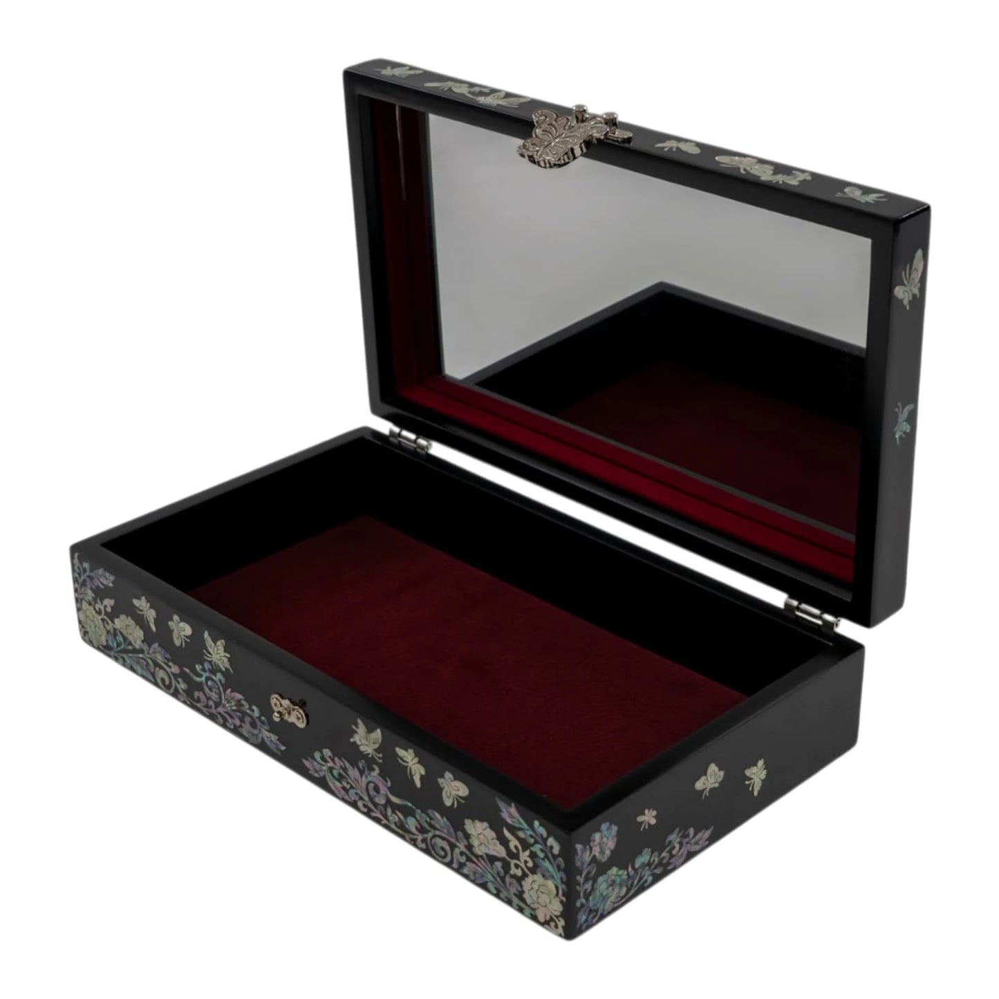 High-angle shot of a black lacquer box displaying full, detailed iridescent nacre artwork of birds, blossoms, and swirling clouds