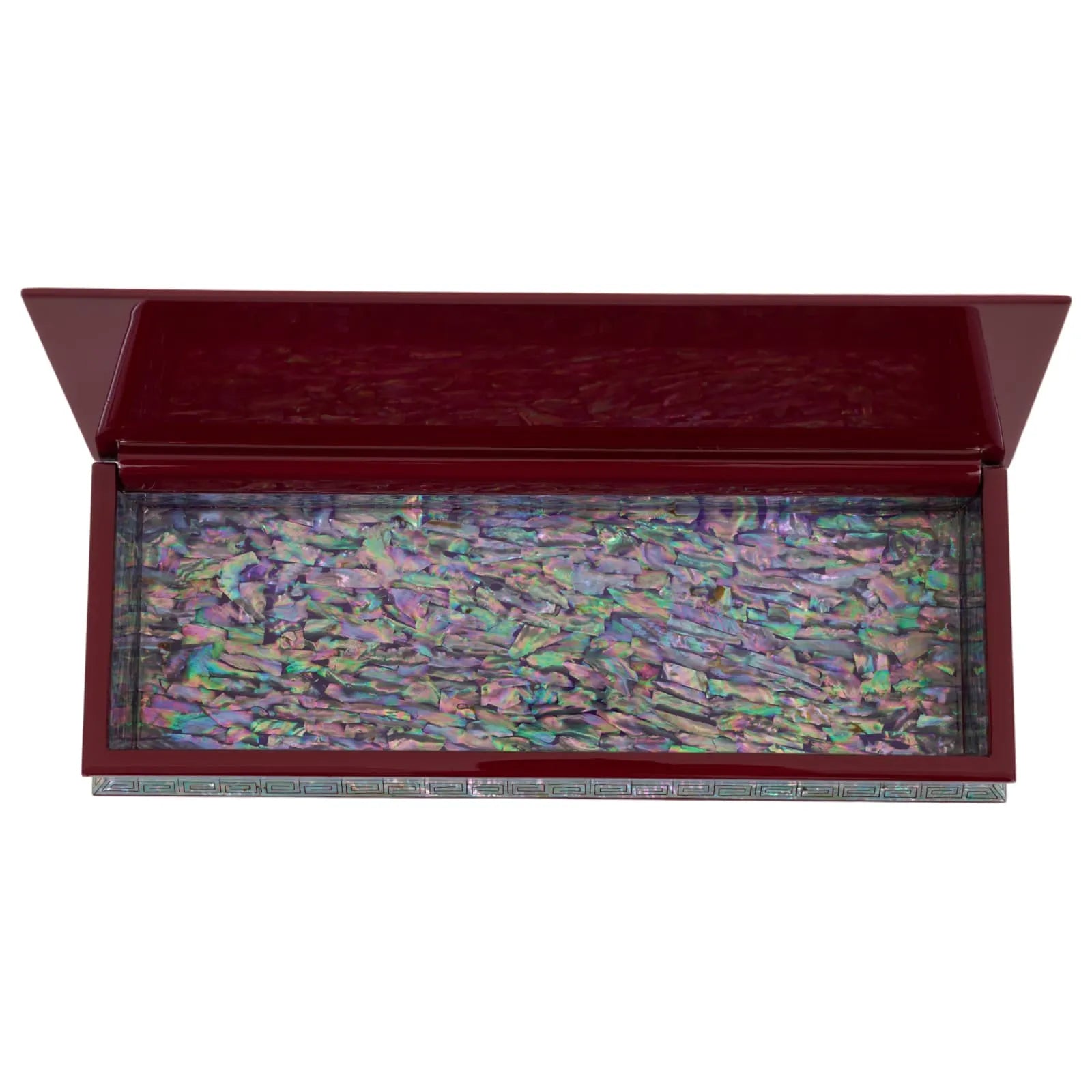 Interior of lacquer box with shimmering abalone shell inlay in vibrant tones