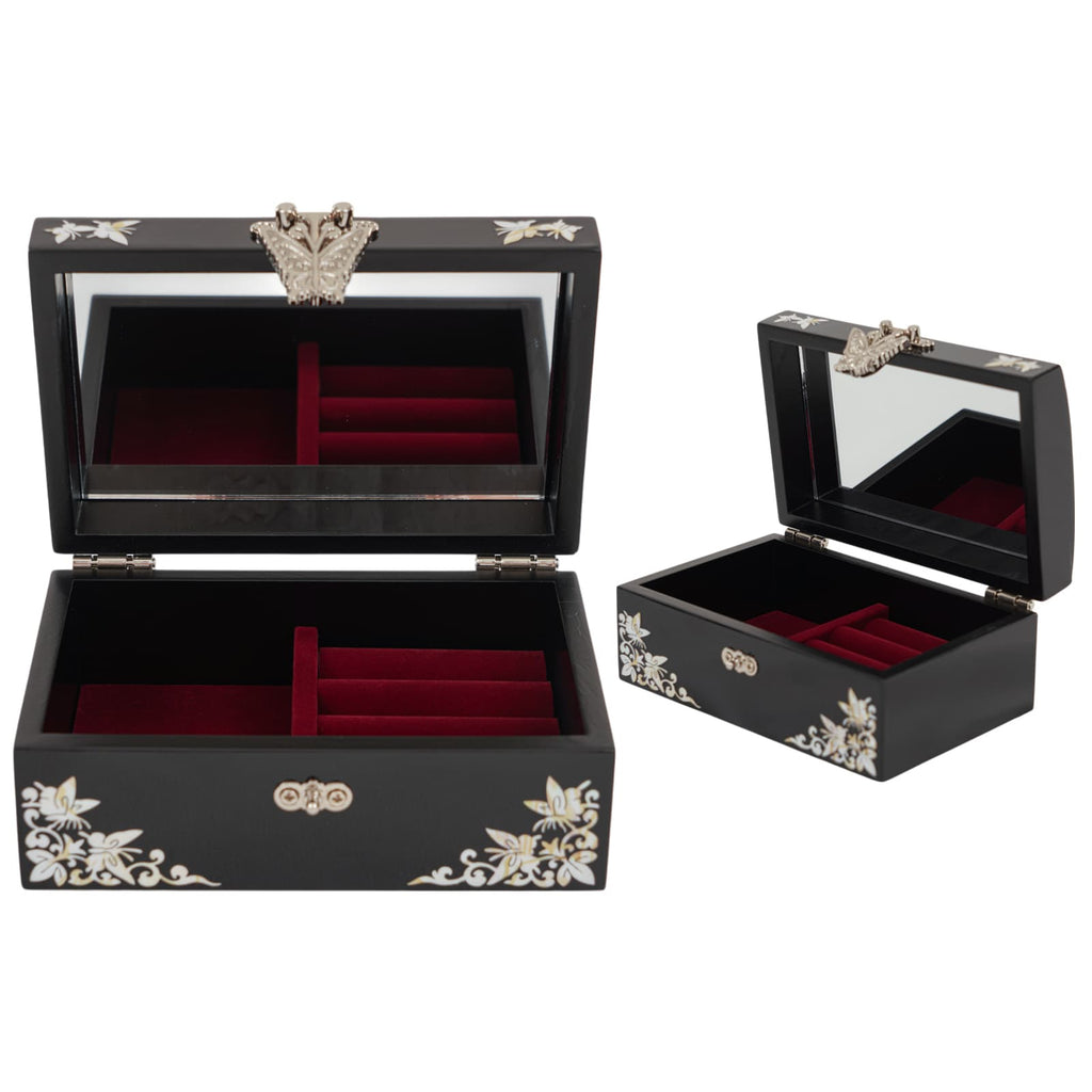 Jewelry box with mirror lid and red velvet compartments for rings and accessories