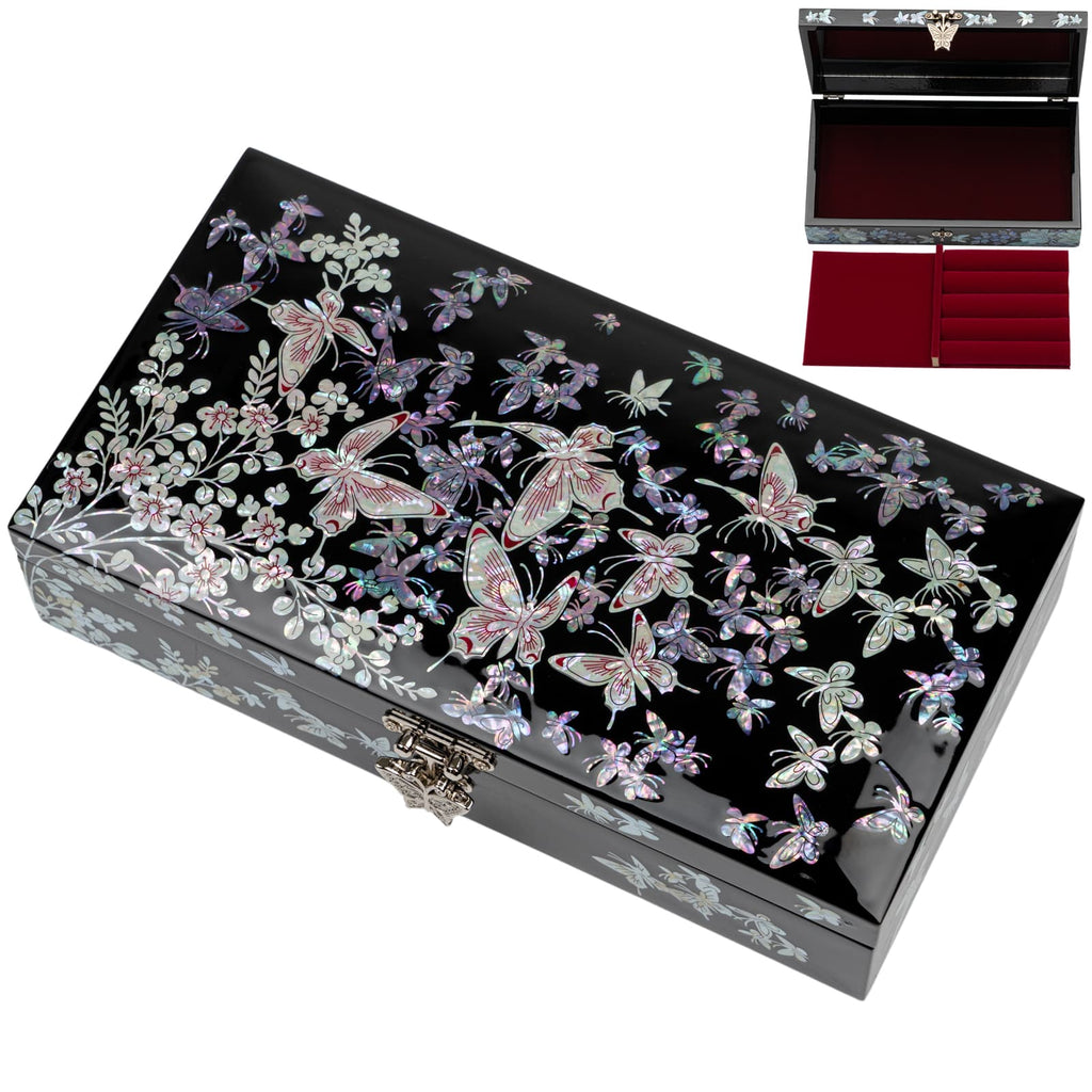 A black lacquered jewelry box with a mother of pearl inlay of butterflies and flowers on the lid, with an inset image showing the red velvet-lined interior.