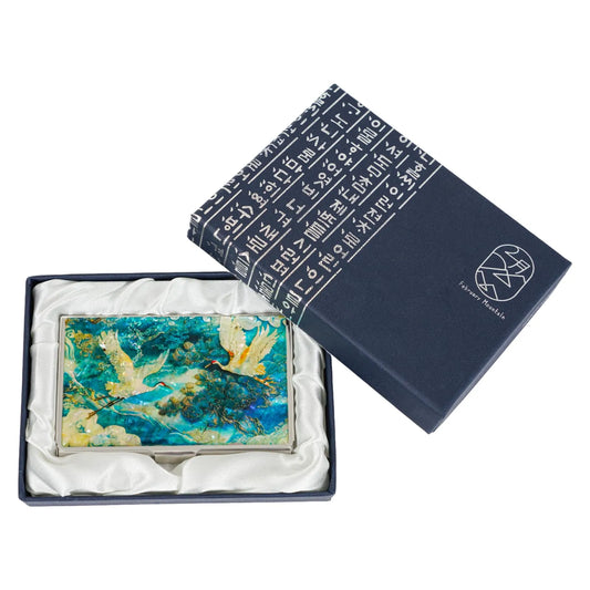 Mother-of-pearl card case with cranes in flight over pine trees, in elegant gift box